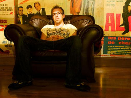 Relaxing at home in his big comfy chair