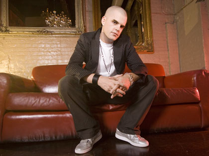 Andy with the classic leather red Chesterfield