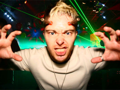 DJ James Condon reaching for the lasers