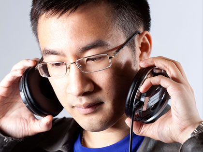 Rodi Style with his headphones on looking all serious
